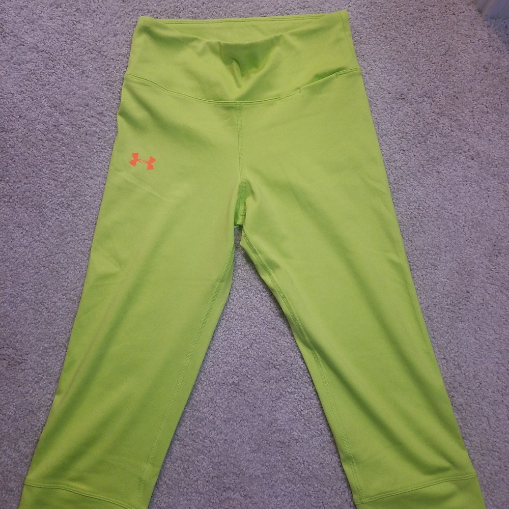 Under Armour Heat Gear leggings. Green w/ pink
